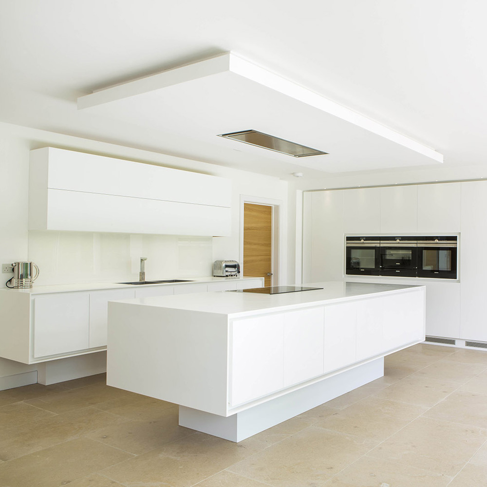 White Plywood Kitchen with Corian Worktops